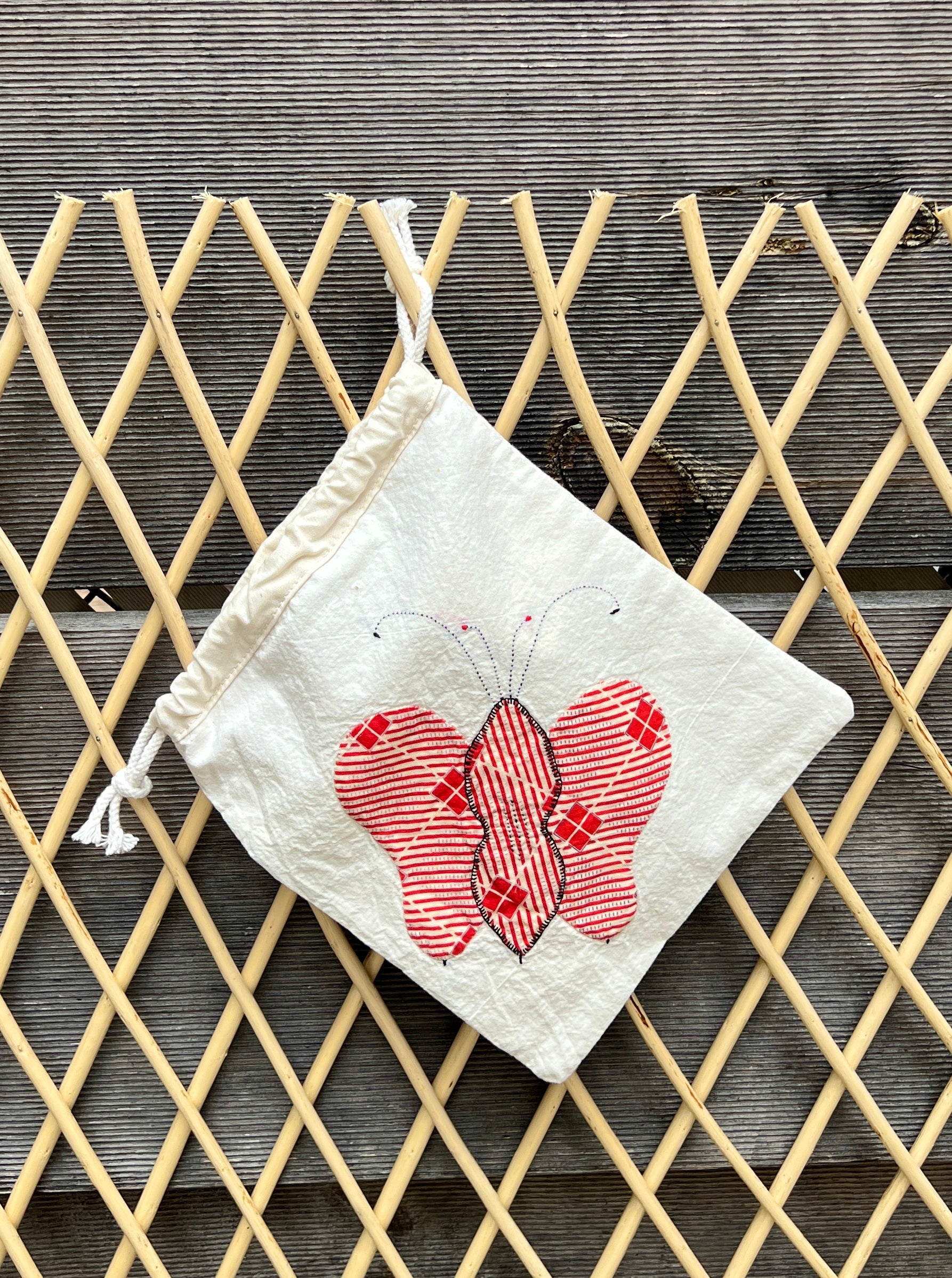4 Antennae Butterfly Drawstring Bag (Blue/Pink Scribbles & Red Squares)