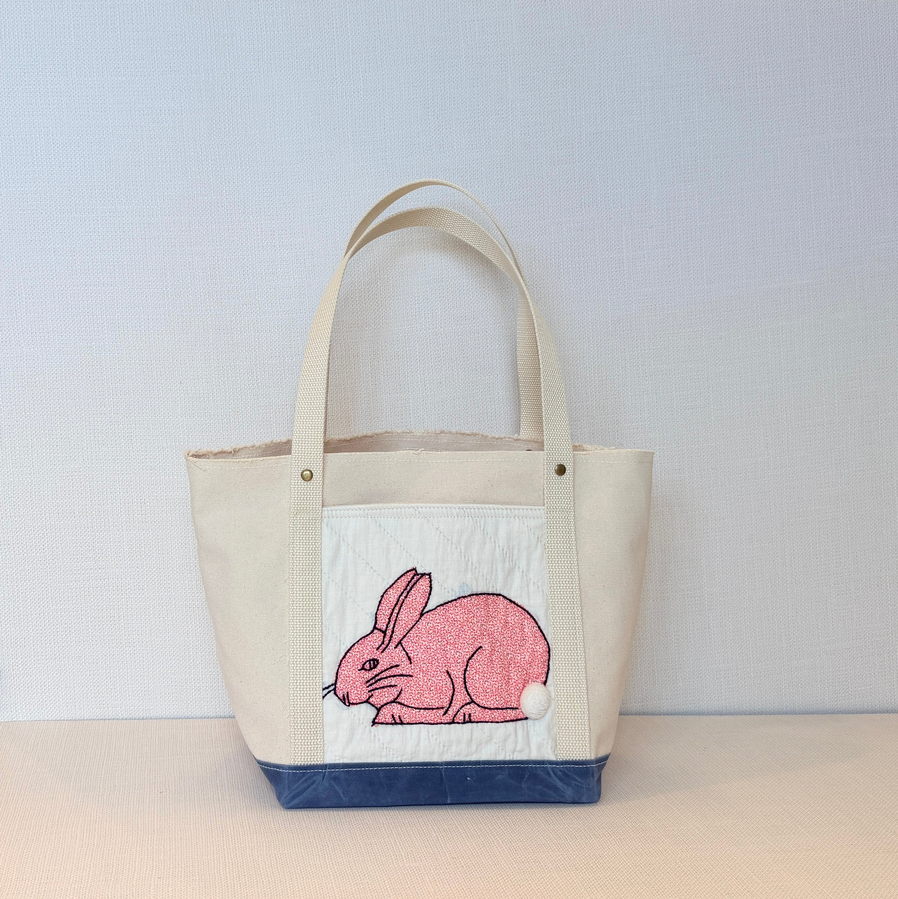 The Skipper Pocket Tote (Blue Canvas Pink Bunny)