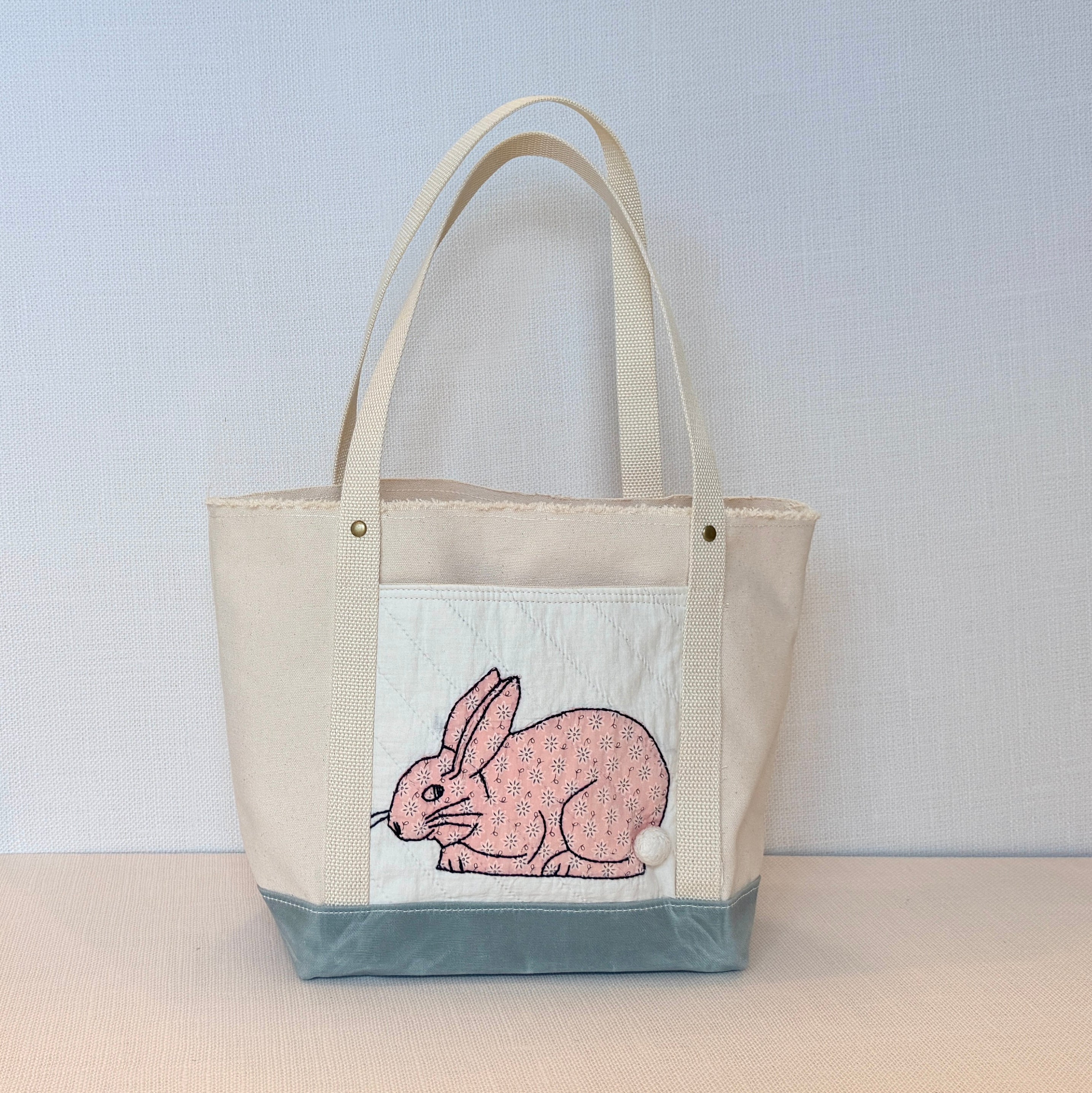 The Skipper Pocket Tote (Teal Gray Canvas Bunny)