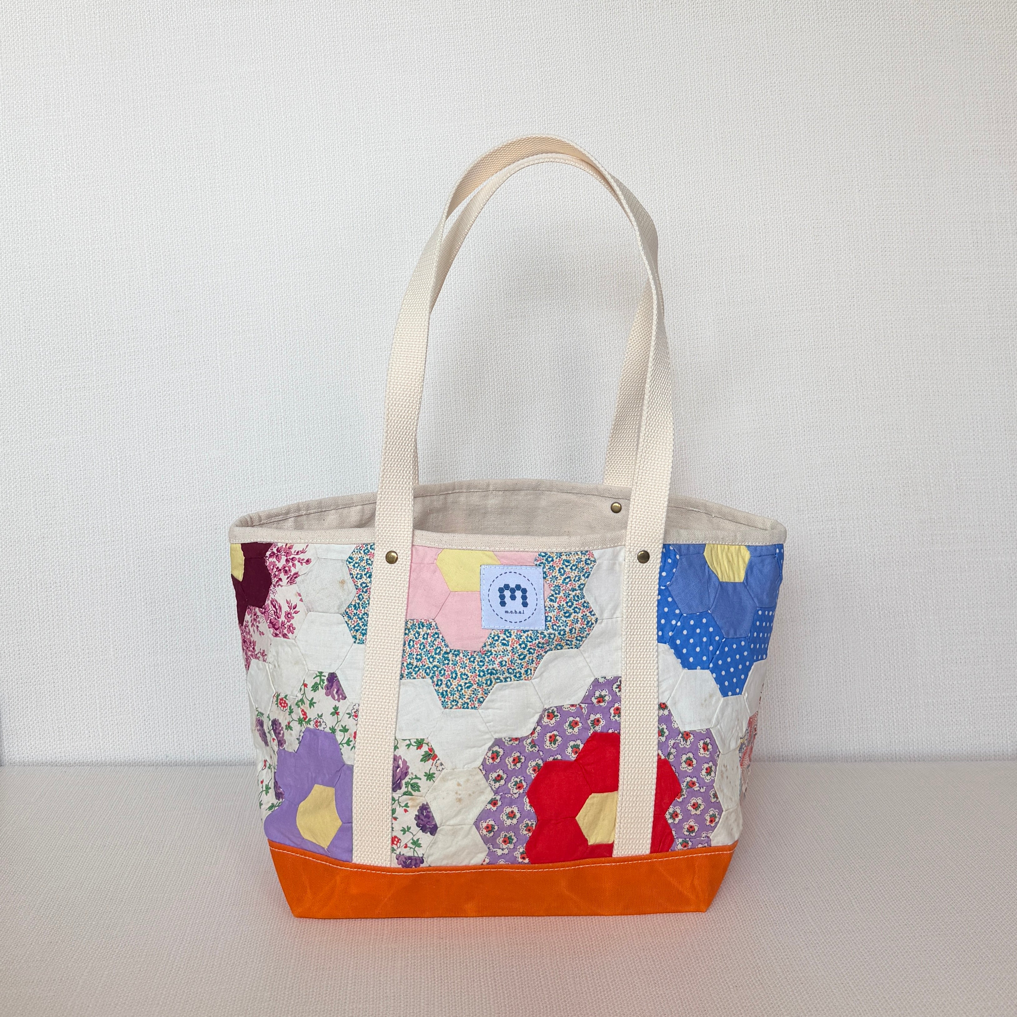 Waxed Canvas Tote Medium (Orange Canvas with Green Flowers)