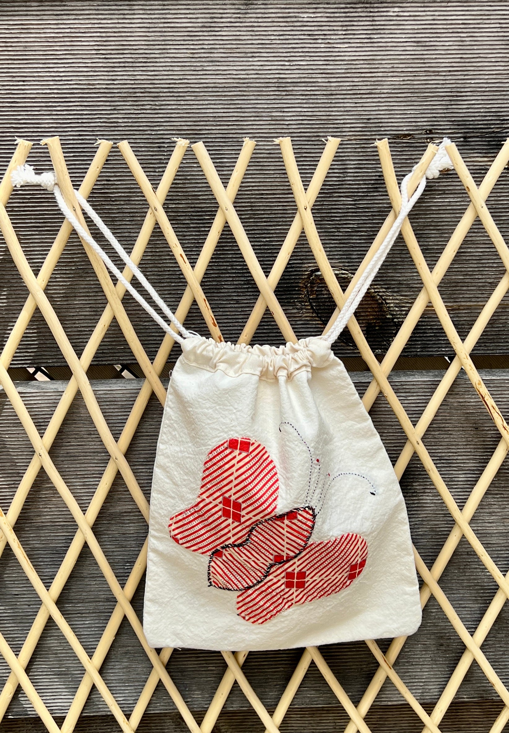4 Antennae Butterfly Drawstring Bag (Blue/Pink Scribbles & Red Squares)