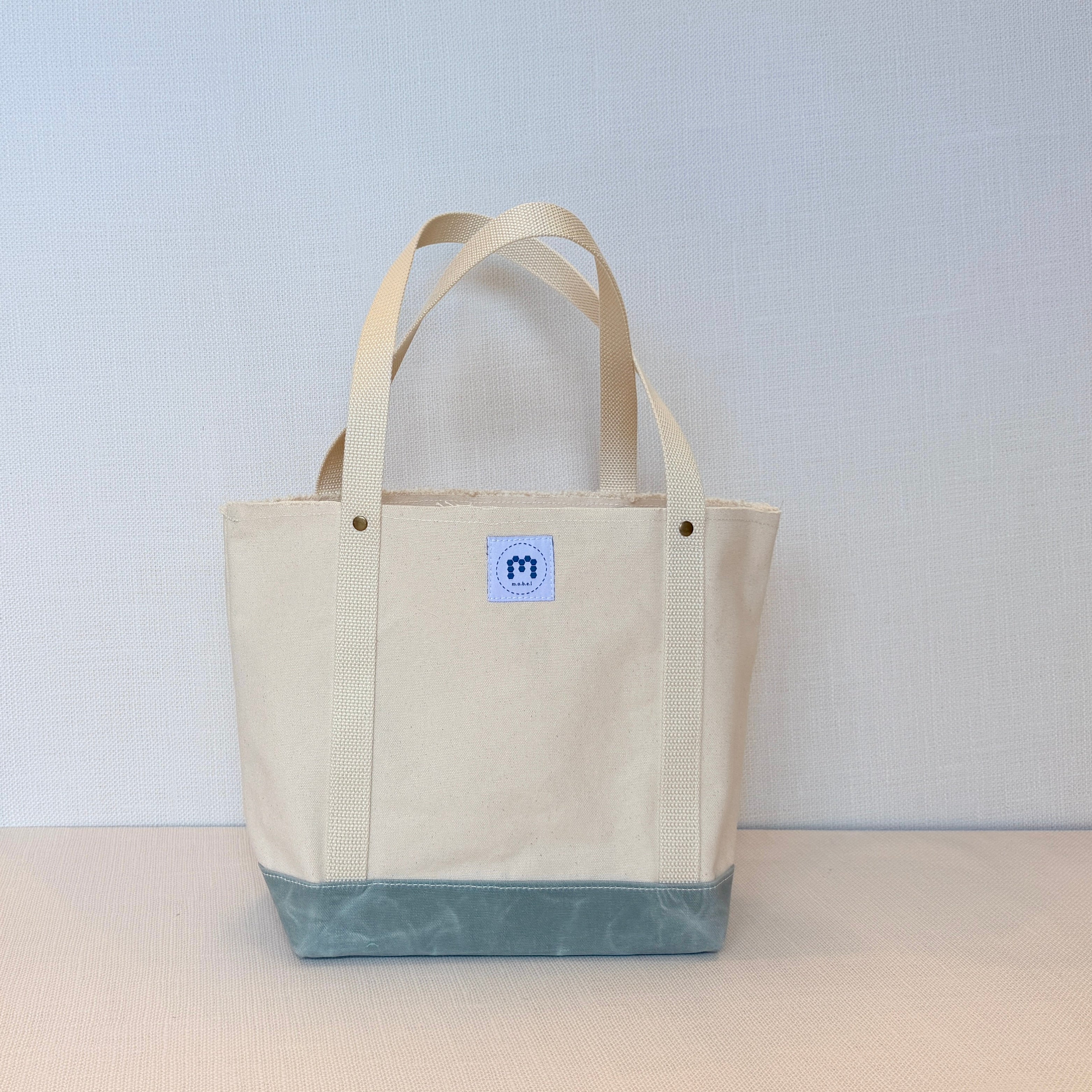 The Skipper Pocket Tote (Teal Gray Canvas Bunny)
