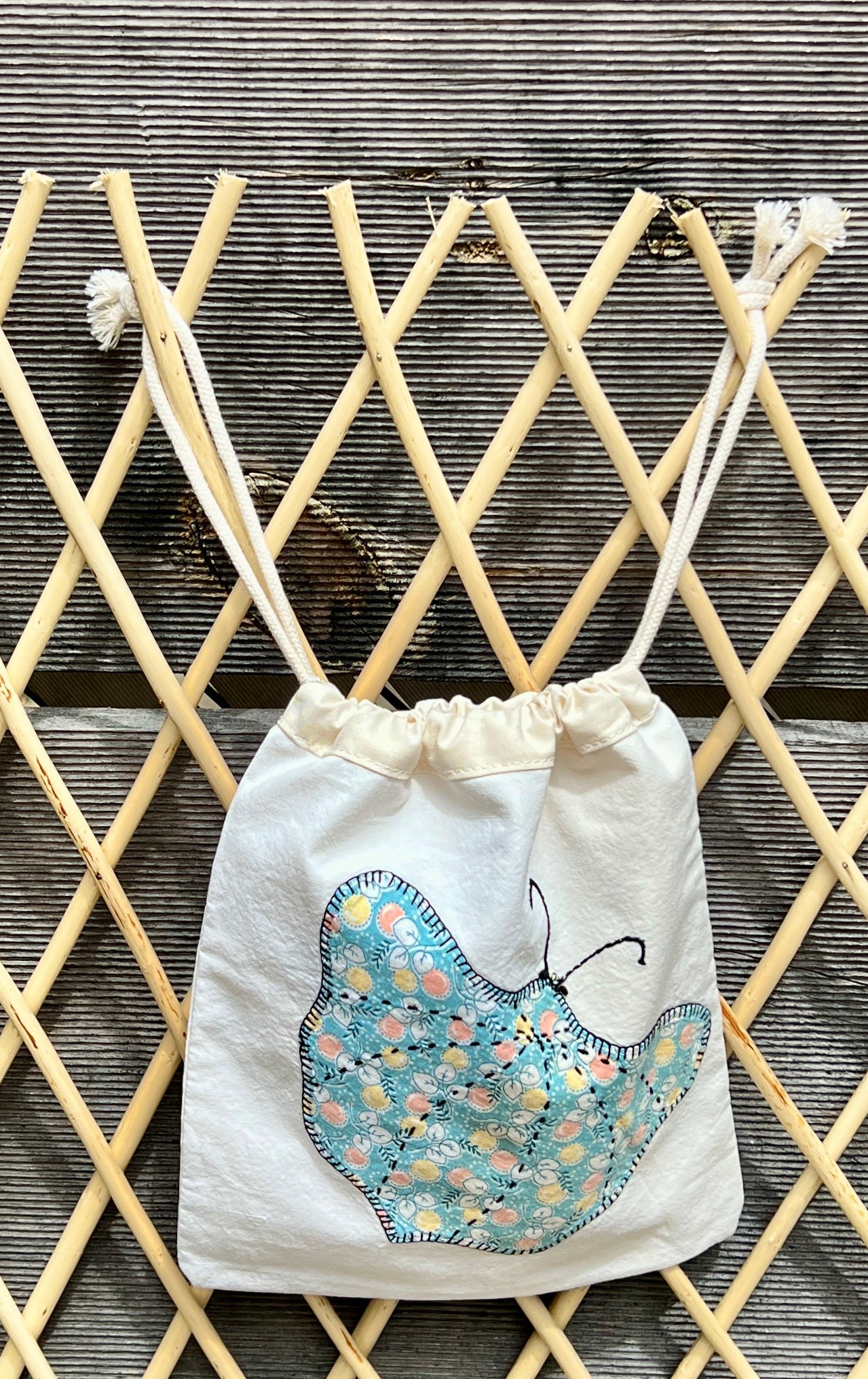 Moth Drawstring Bag (Teal Leaves & Purple Dots)
